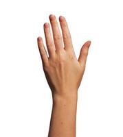 Hand raised in greeting, fingers open, waving with suntan visible on wrist and arm. Sign of photo