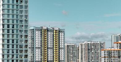 Cityscape skyline with modern high-rise buildings, urban architecture, and residential condos. photo