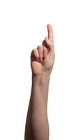Female hand with an extended index finger pointing upward, symbolizing indication, selection, or photo