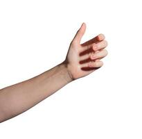 Female hand holding invisible object, grasping gesture with fingers positioned for grip. Isolated on photo