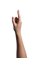 Female hand pointing with index finger extended, gesture symbolizing direction, selection, or photo