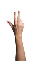 Female hand showing three fingers, with thumb, index, and middle fingers extended. Gesture photo