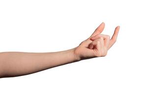 Hand grasping an invisible object between thumb and index finger. Gesture showing grip, motion, and photo