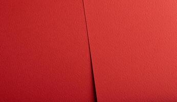 Bright red paper background with a matte texture and rough grain. Bold, vibrant tones create an photo