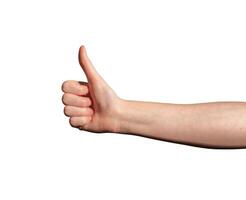 Hand showing thumbs-up gesture. Caucasian female expressing approval, success, and positivity. Light photo