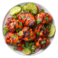 Tasty tandoori chicken plate with vegetable and lime slices isolated on transparent background png