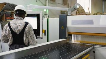 CNC Operator Cutting OSB Sheets in Wood Factory video