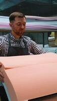 Man Assembling Upholstery Foam on Sofa Backrest video