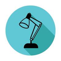 A black and white lamp on a desk vector