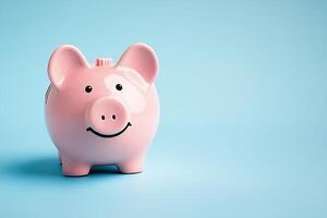 A pink piggy bank with a smiley face on it photo