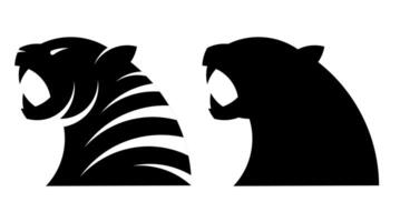 Silhouettes of head of roaring angry tiger with open mouth and sharp teeth. Symbol, emblem of new year 2022. Simple black and white isolated on white background vector