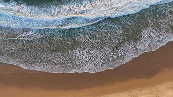 Aerial View of Gentle Waves on Empty Beach video