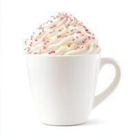 white cup filled with colorful whipped cream and sprinkles photo