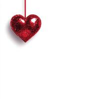 Red glitter heart hanging on white background photo