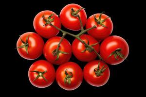 A bunch of tomatoes on a black background photo