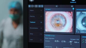 Ophthalmic surgery. View on the screen of medical monitor in operating room. Lasik 9 video
