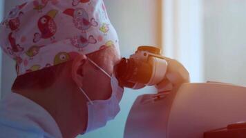 male surgeon in uniform in front of eye vision surgery operation room at clinic video