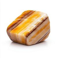 single piece of sandstone with ripple pattern on white background photo