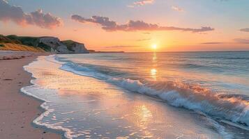 Sunrise over a tranquil beach with gentle waves lapping the shore, colorful sky, and hills in the background. photo