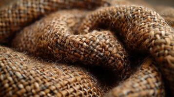 Close-up view of a textured woven fabric with intricate weave patterns. photo