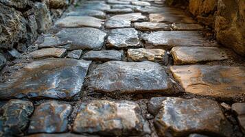 Close-up view of ancient cobblestone path. photo