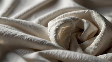 wrinkled cotton cloth surface in bright white, illuminated by soft, diffused light, highlighting the natural folds and fine texture. Show the gentle shadows that enhance the clean photo