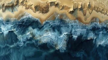 Aerial view of waves crashing on a sandy beach. High angle, detailed view of turbulent ocean water meeting the beach. Sand dunes and cliffs in the background. Abstract textures of sand and water. photo