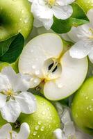 Green Apples and Apple Blossoms with Water Droplets photo