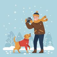 Man Photographing Dog in Snowy Winter Landscape with Camera vector