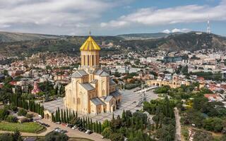 Aerial view of Tsminda Sameba Cathedral in Tbilisi photo