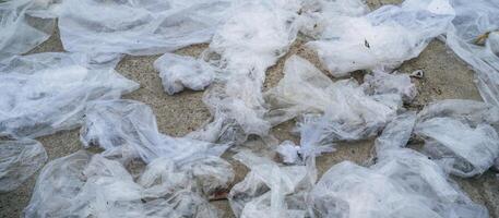 panoramic background of trash,plastic bags at the beach. environmental problem concept and healing the world photo