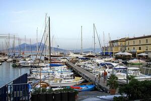 Marina with yachts and Vesuvius in Naples. photo