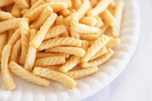 Crispy prawn cracker sticks, Shrimp crisp rice snack. Concept, traditional crunchy food snack appetizer. Junk food. photo
