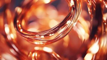 Copper wire coils shine in a soft light creating a captivating visual effect photo
