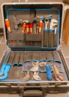 Organized Tool Kit with Assorted Tools Displayed photo