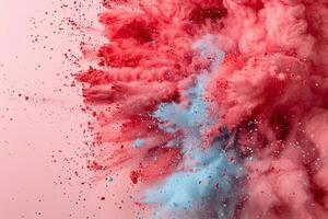 Abstract explosion of pink and blue powder. A vibrant display of color in motion photo