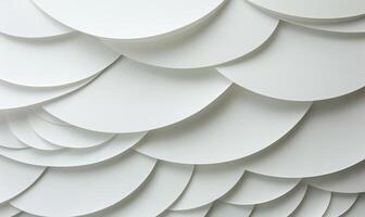 Abstract layered circles in soft white. A textured pattern of overlapping circles creates a visual depth. Soft light highlights the curves and folds photo
