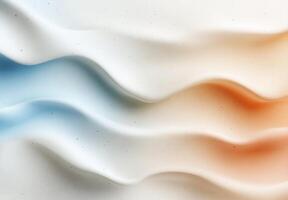 Abstract cosmetic texture. Soft flowing waves of cream, blending from cool blue to warm orange. Detailed surface with subtle specks photo