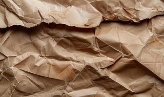A brown crumpled paper with a few pieces of brown paper photo