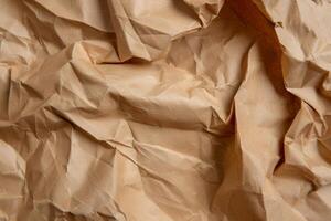 Crumpled brown paper texture photo