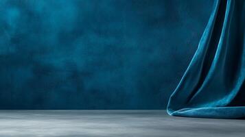Deep teal backdrop with draped fabric photo