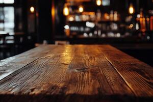 Rustic wooden bar top in a dimly lit pub photo