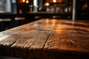 Rustic wooden table in a dimly lit bar photo