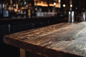 A close up of a bar counter with a wooden top photo