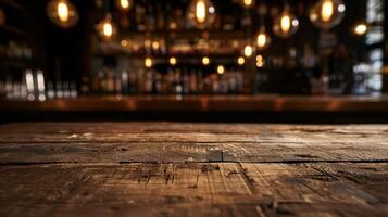 Rustic wooden bar top, blurred background of dimly lit bar area with hanging lights photo