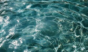 Rippled turquoise water surface photo