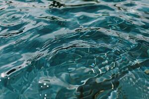 Rippled teal pool water surface photo