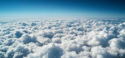 An aerial view of clouds from an airplane photo