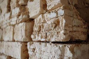 Stacked light beige building blocks photo