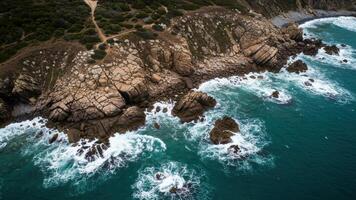 A beautiful coastal scene with crashing waves against rocky cliffs photo